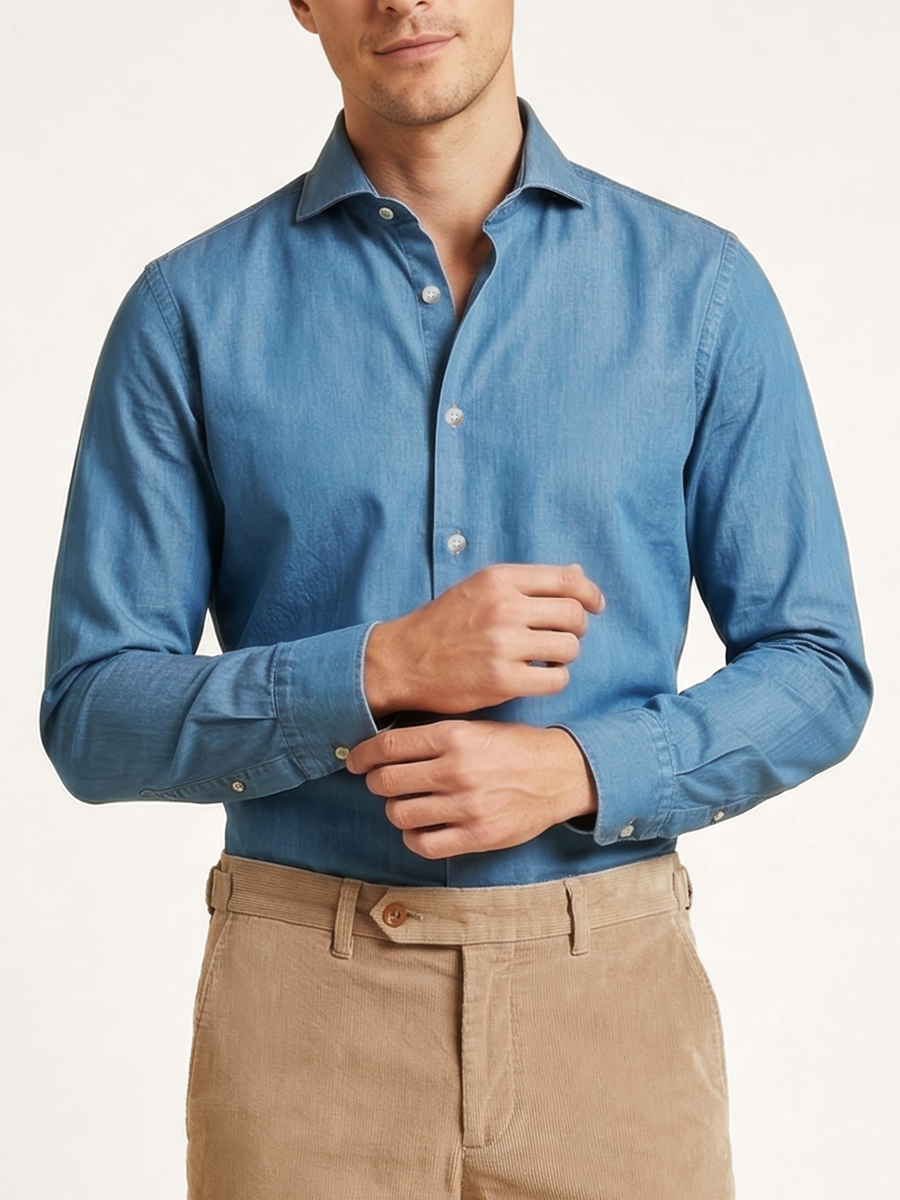 Men’s blue chambray shirt with Italian spread collar, worn