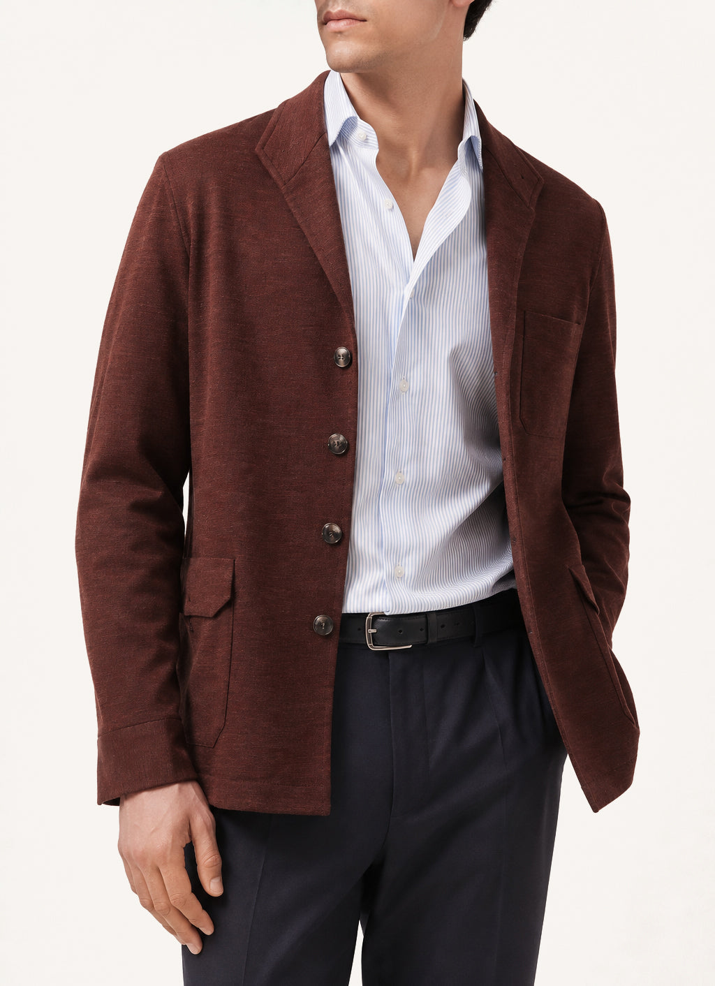 Man wearing a burgundy knitted cashmere Teba jacket by Justo Gimeno for Santamaria