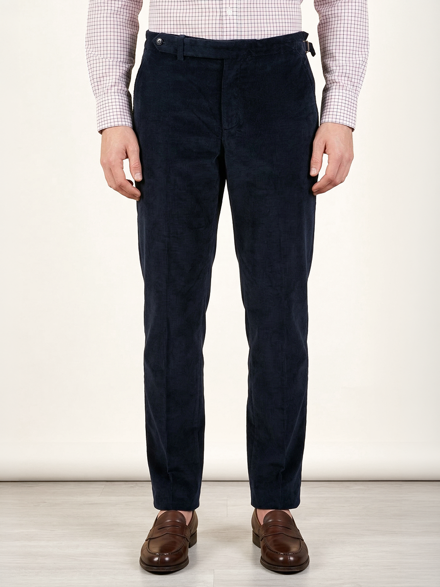 Man wearing navy corduroy trousers by Santamaria