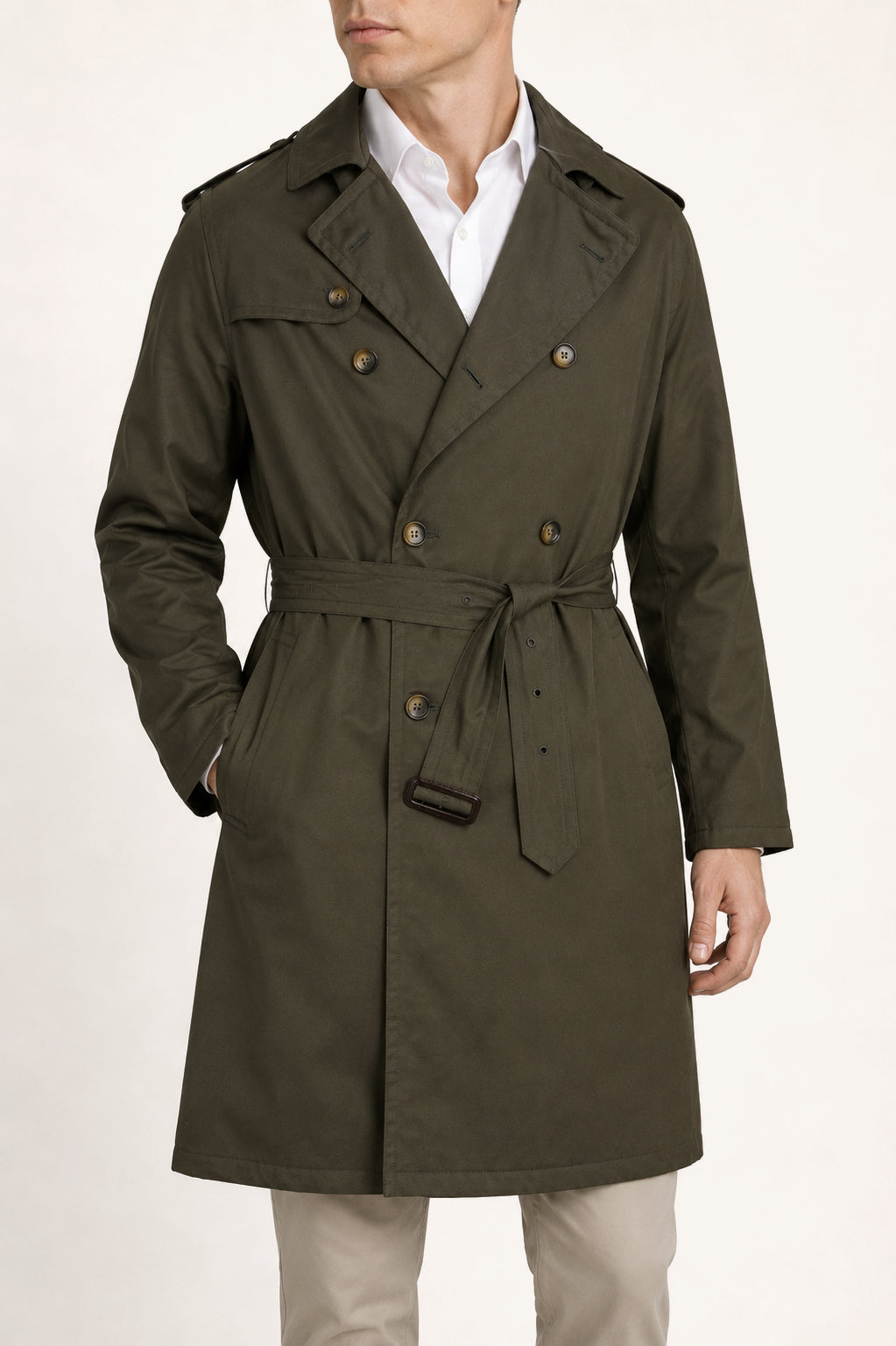 Man wearing an olive cotton trench coat by Justo Gimeno for Santamaria
