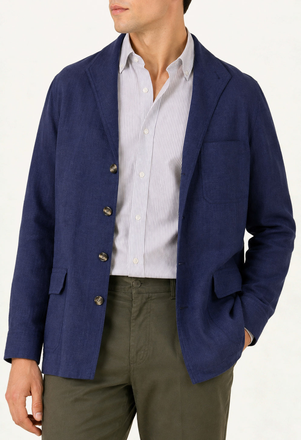 Man wearing a royal blue linen Teba jacket by Justo Gimeno for Santamaria