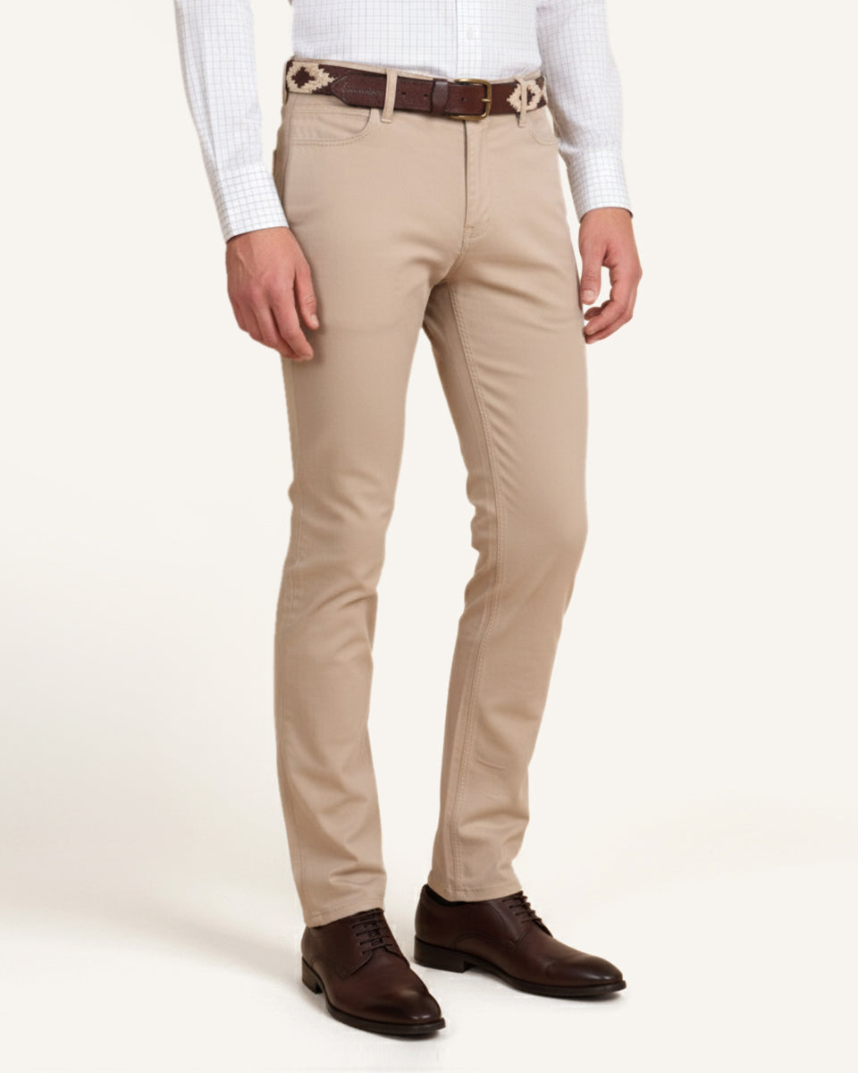 Man wearing tan five-pocket cotton trousers by Santamaria