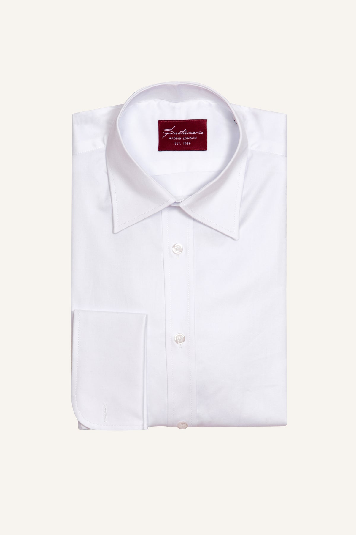 White twill double cuff shirt with English point collar, flat lay
